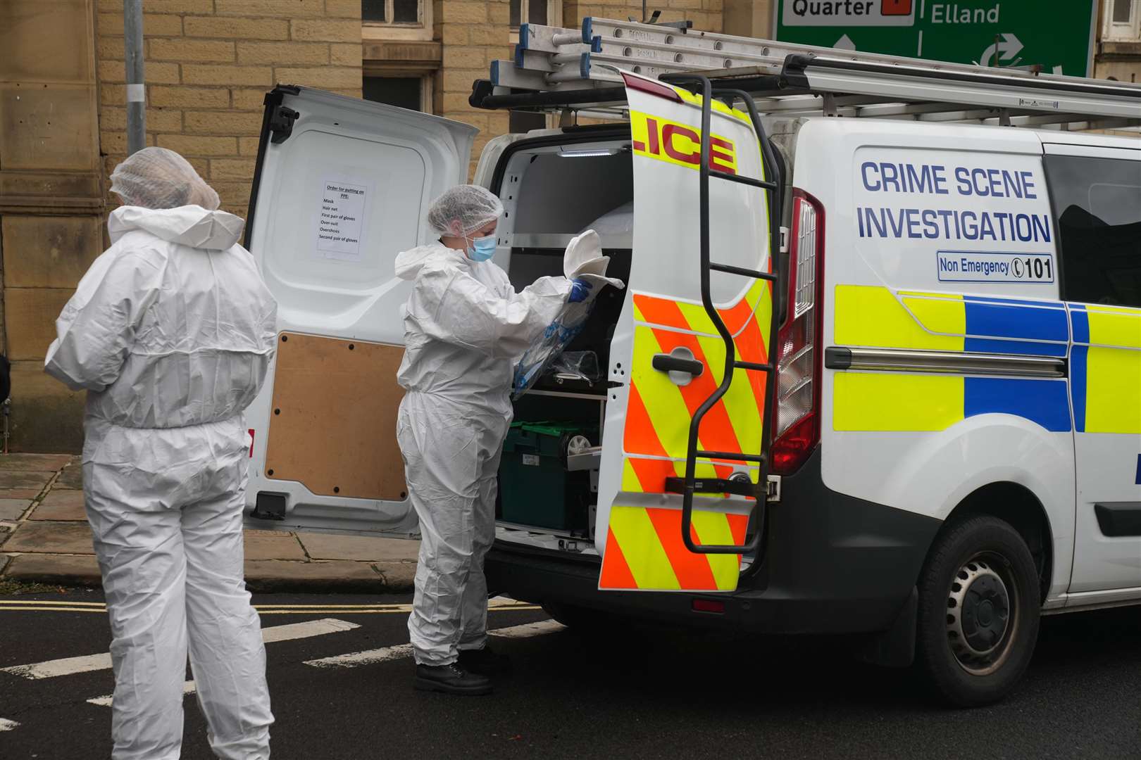 Police activity at the scene of the incident in Halifax, West Yorkshire (Danny Lawson/PA)