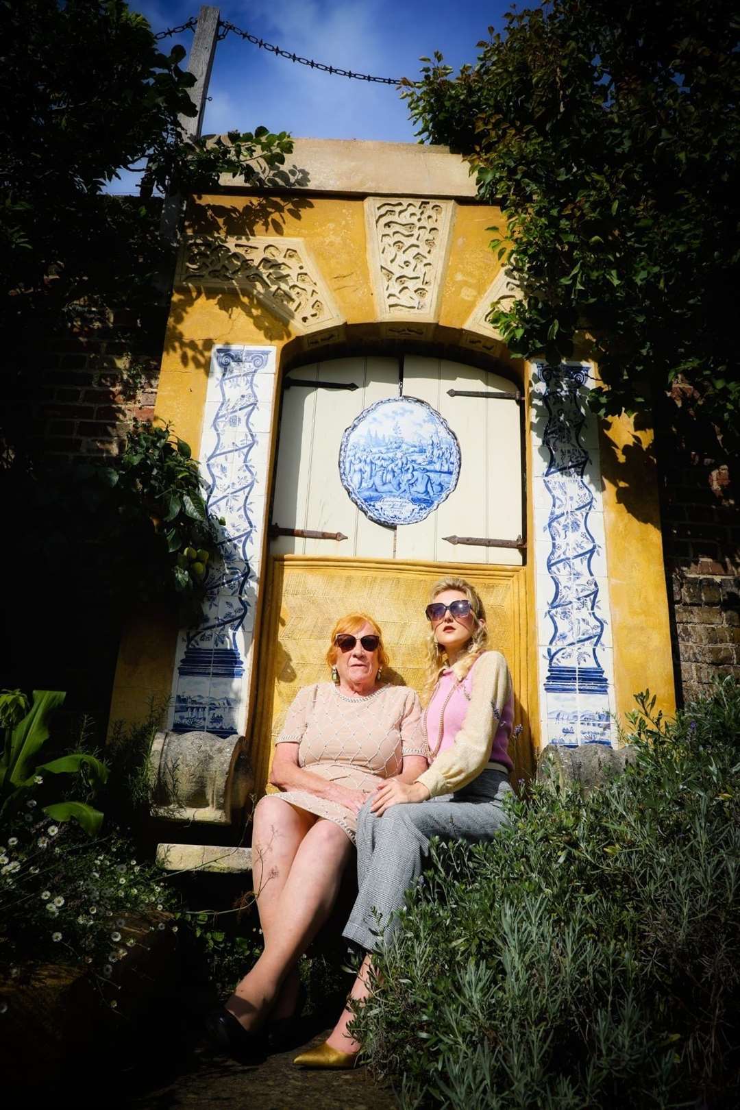 Wonderwall photo shoot at Restoration House, Rochester, for the Wisdom Hospice. Volunteer Molly Johal from the Chatham shop. left, with model Megan Coull. Picture: Lisa Kennedy