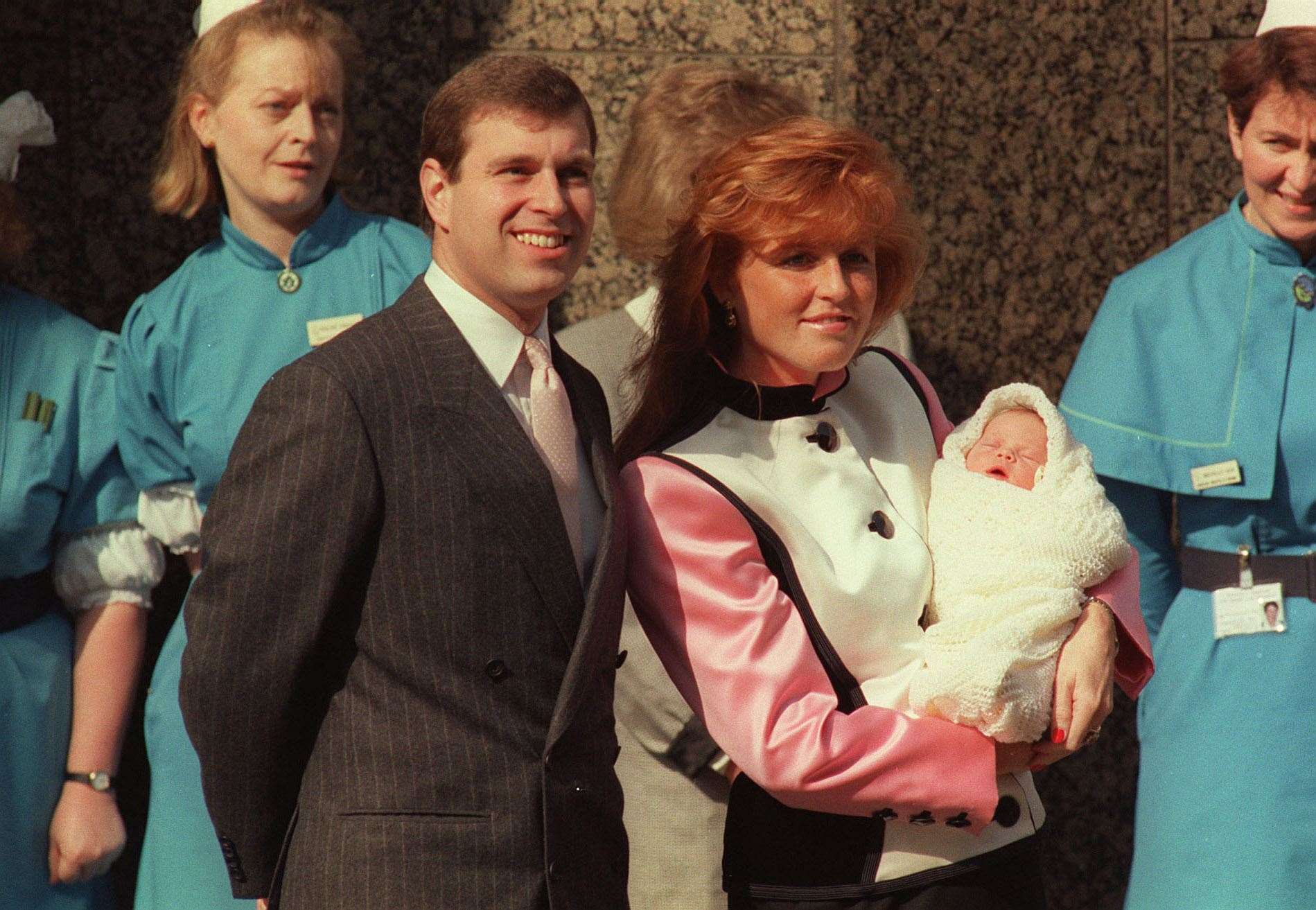 The Duke and Duchess of York outside the Portland Hospital in London with baby Princess Eugenie (Martin Keene/PA)