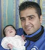 Dad Sukh Narwan and his baby daughter