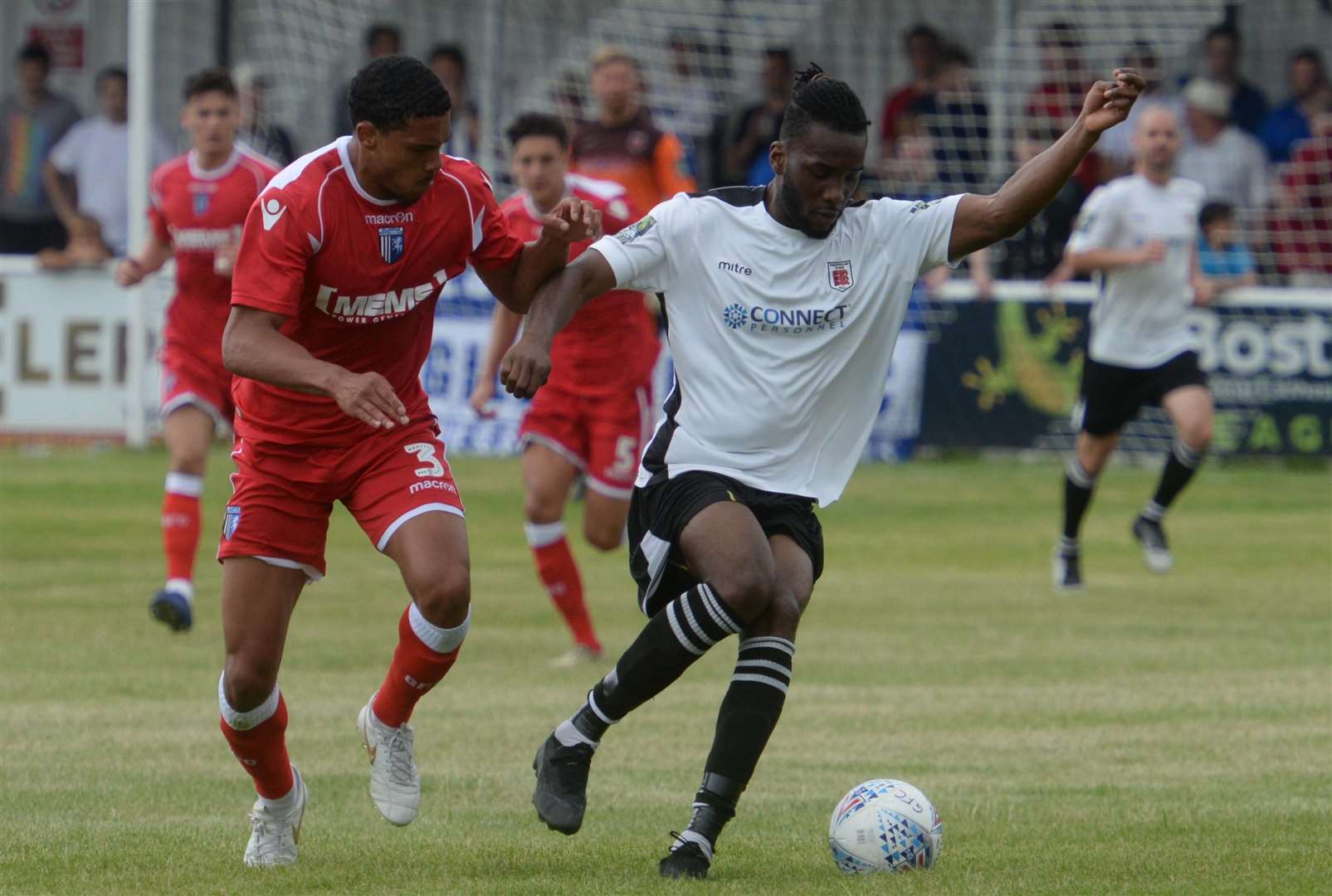 Gillingham's Bradley Garmston watches his man Picture: Chris Davey