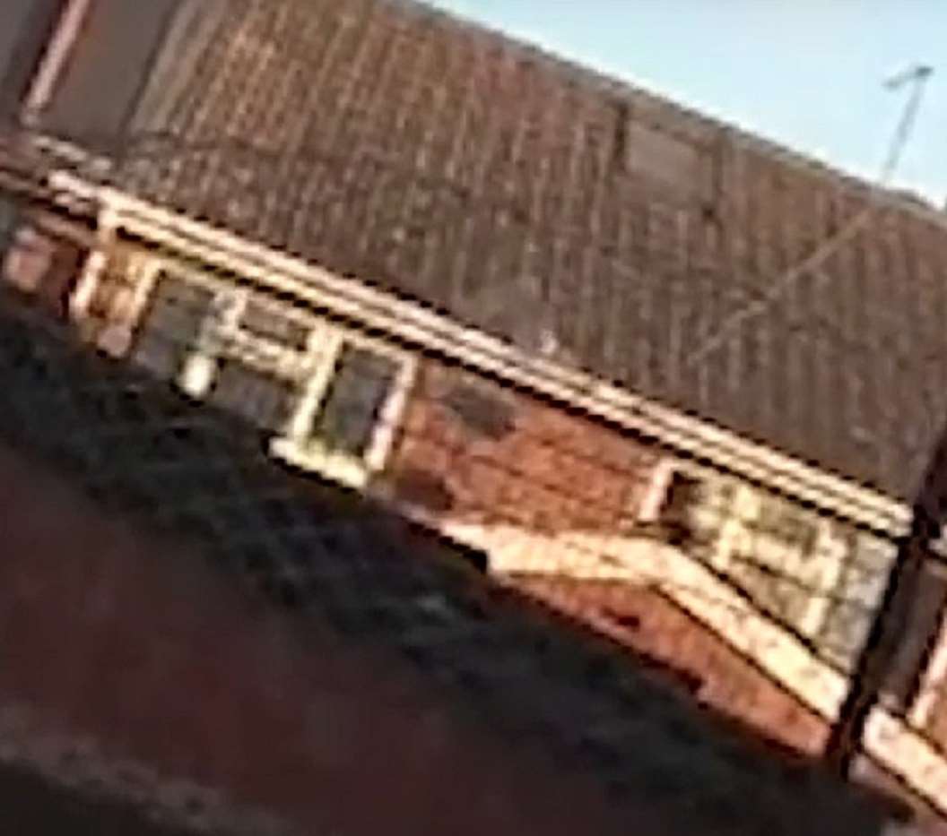 The safe slides along the tiles before plunging on to a flat roof (West Midlands Police/PA)