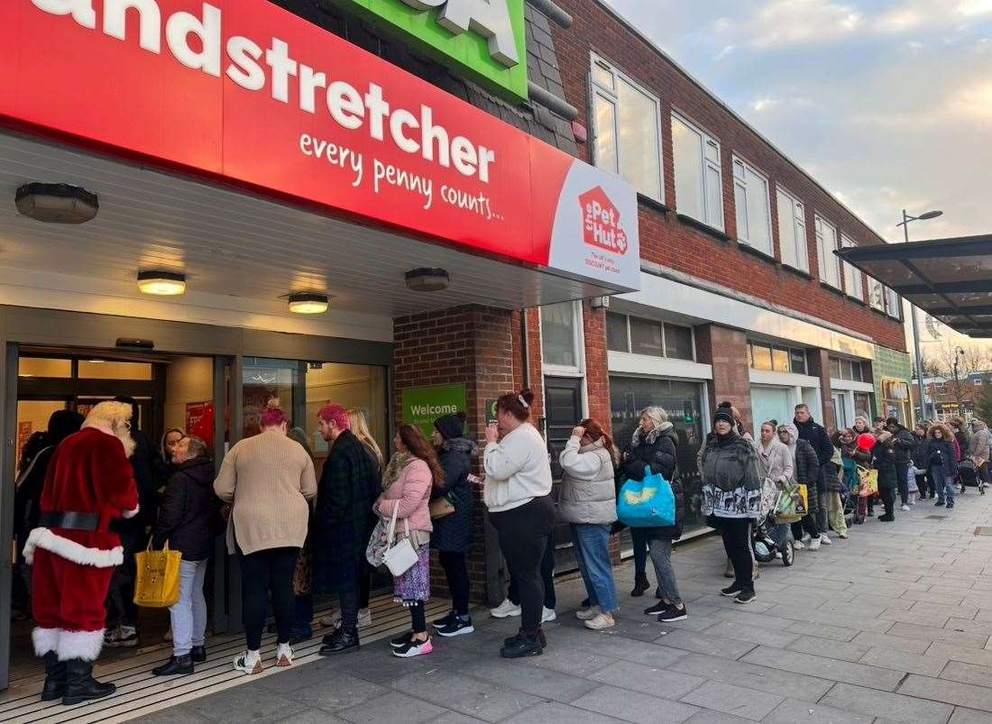 Santa was there to greet those in the queue for the opening of Poundstretchers in Strood High Street