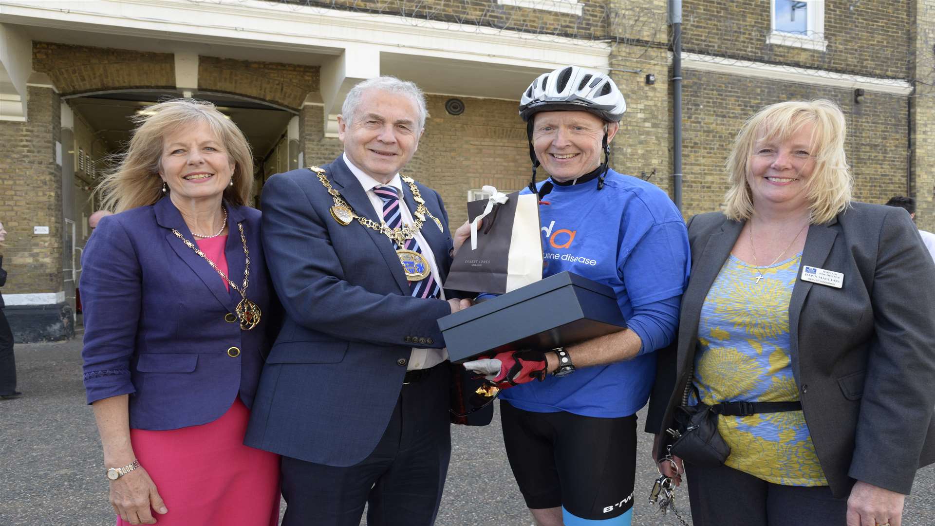 The Mayor and Mayoress of Medway, Stuart and Sarah Tranter, and deputy governor Dawn Mauldon present Andy Rowett with his 30-year service award