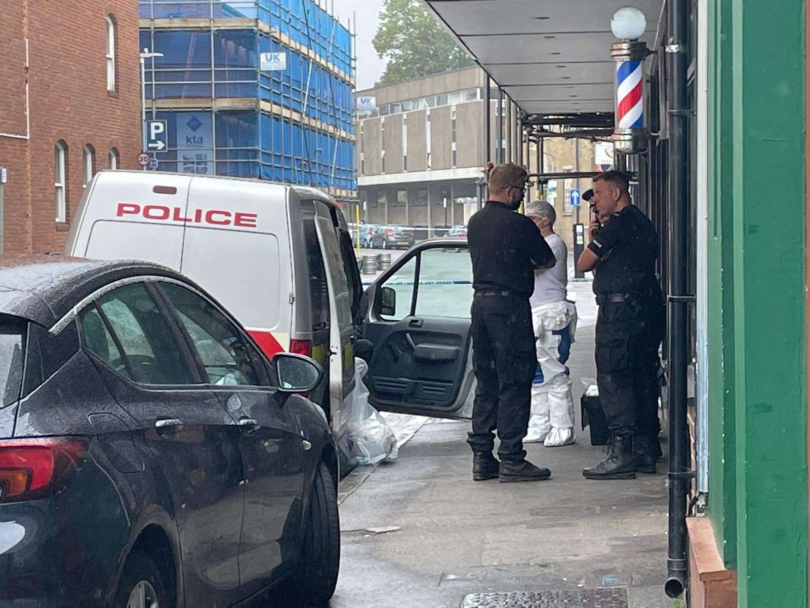 Forensics teams shut of multiple streets in the town after the incident. Picture: Sean McPolin