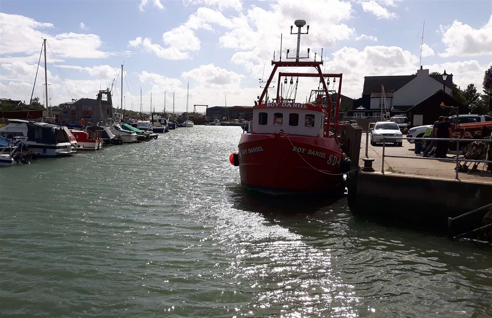 Emergency services were called to Queenborough Harbour after her body was found