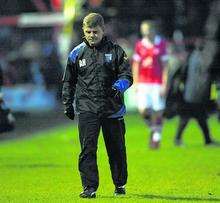 Andy Hessenthaler cuts a disconsolant figure after Gills' 4-3 defeat.