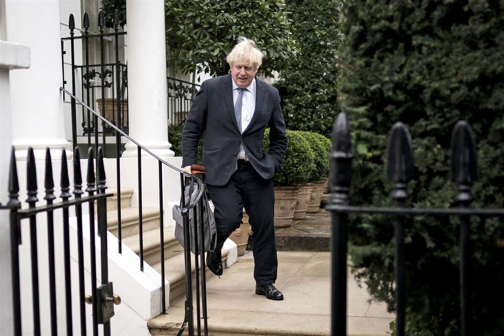 Former prime minister Boris Johnson leaves his home in London on Tuesday (Aaron Chown/PA)