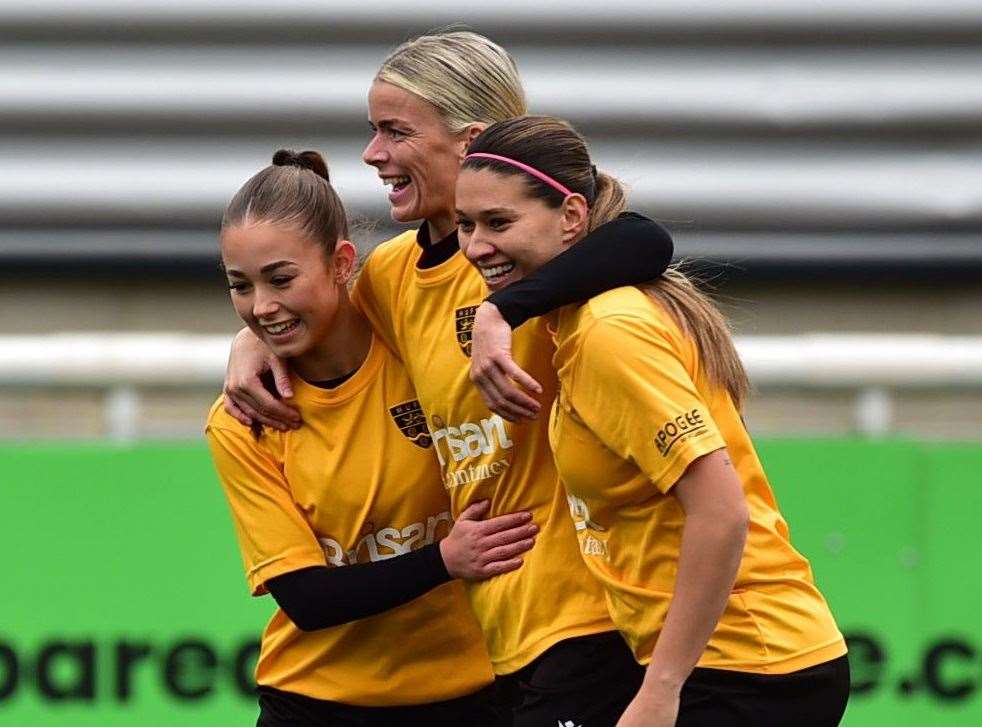 Georgia Culpitt, centre, celebrates with Maidstone team-mates. Picture: Steve Terrell