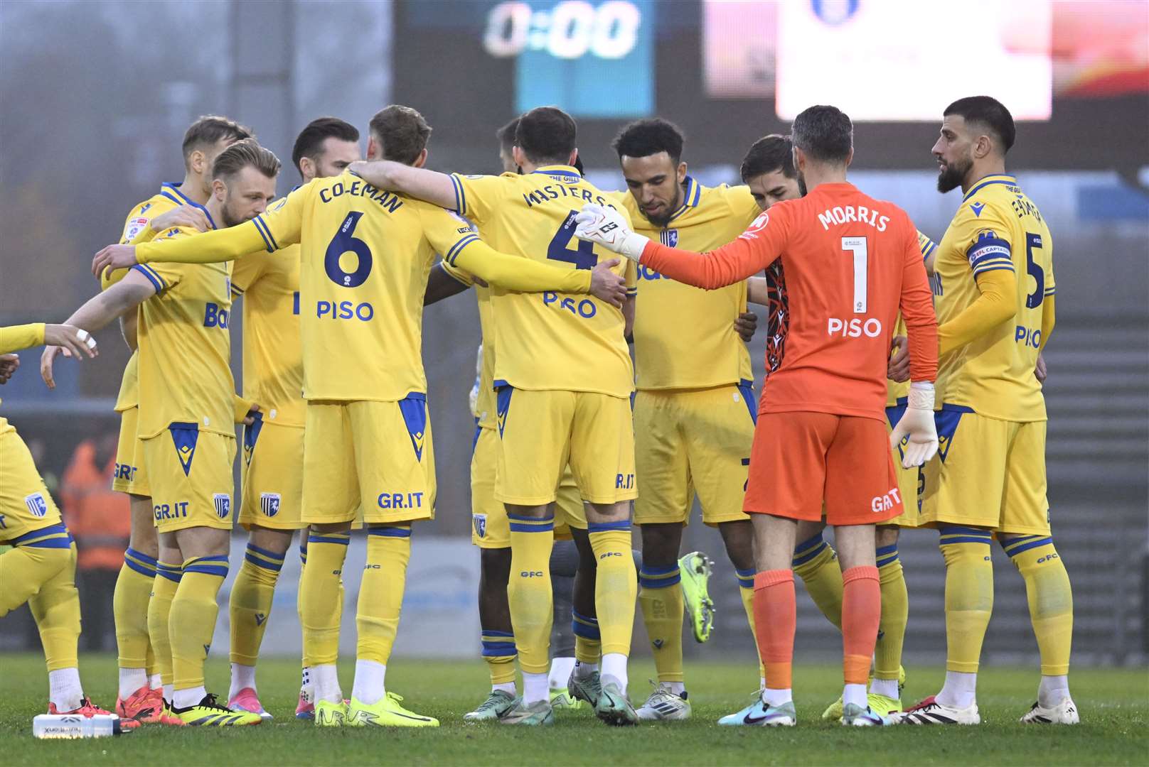 Pre-match huddle ahead of Gillingham’s game against Colchester Picture: Barry Goodwin