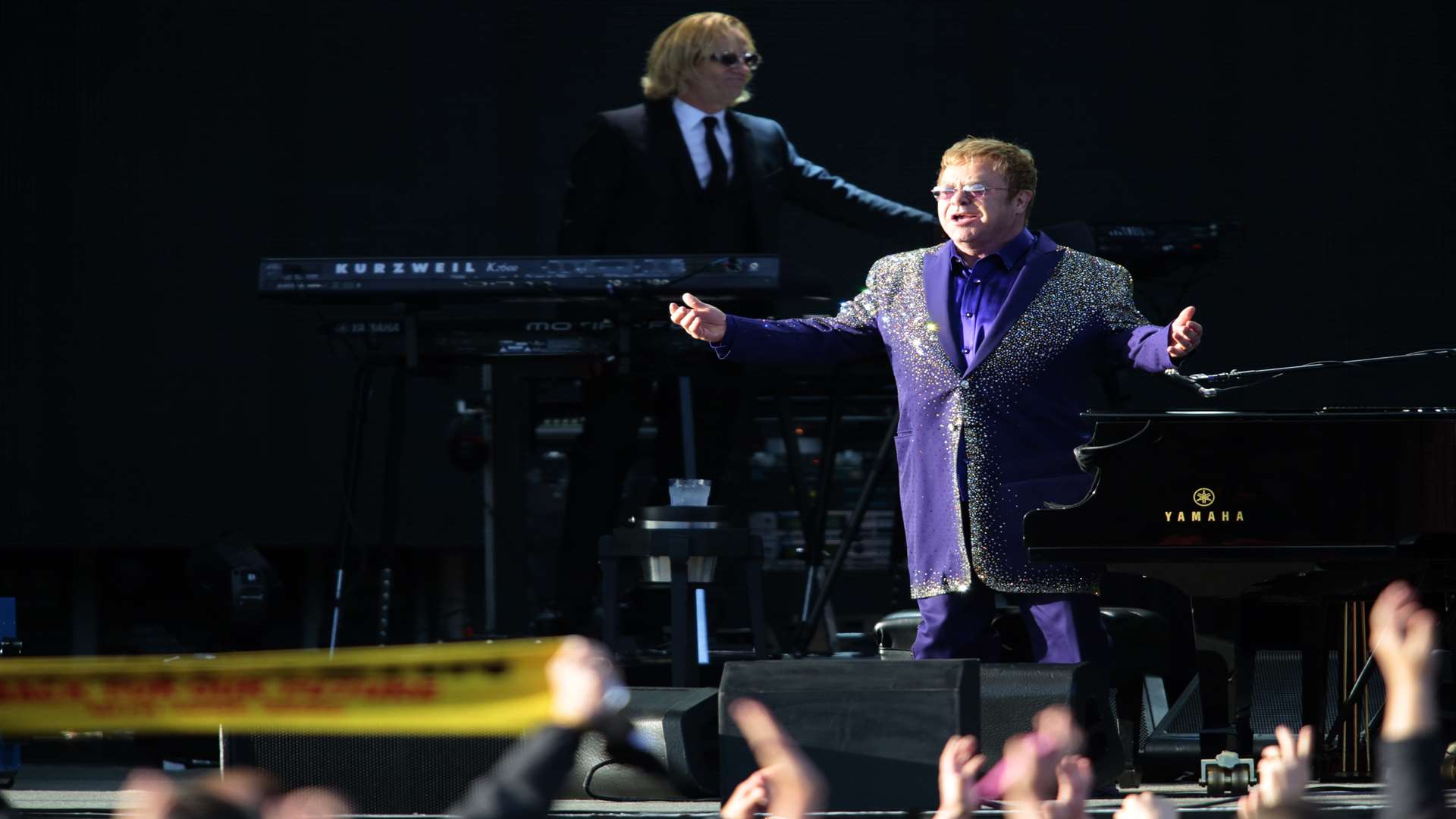 Elton on his feet to greet the crowd. Picture: Martin Apps
