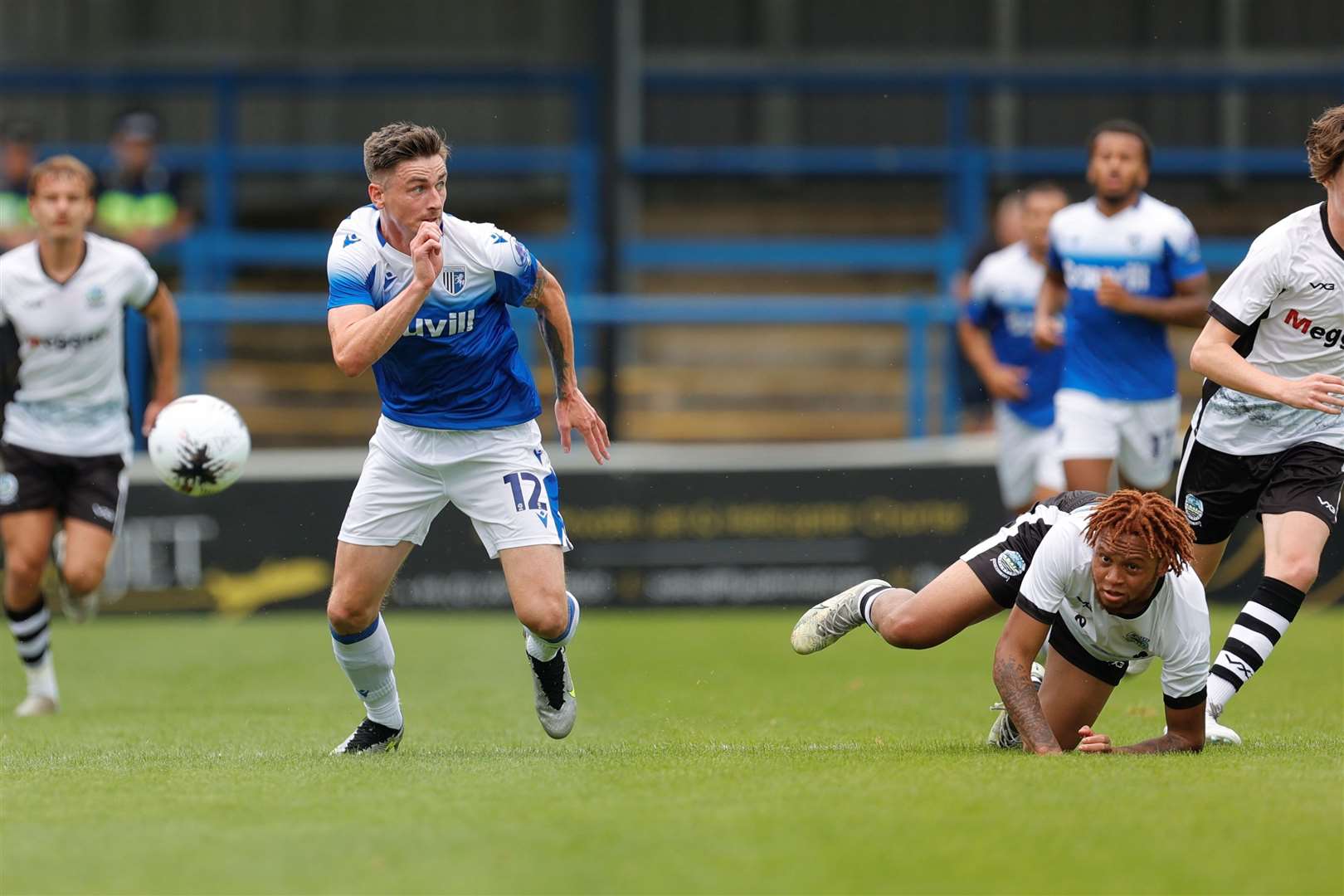 Gillingham striker Oli Hawkins up against Dover on Saturday