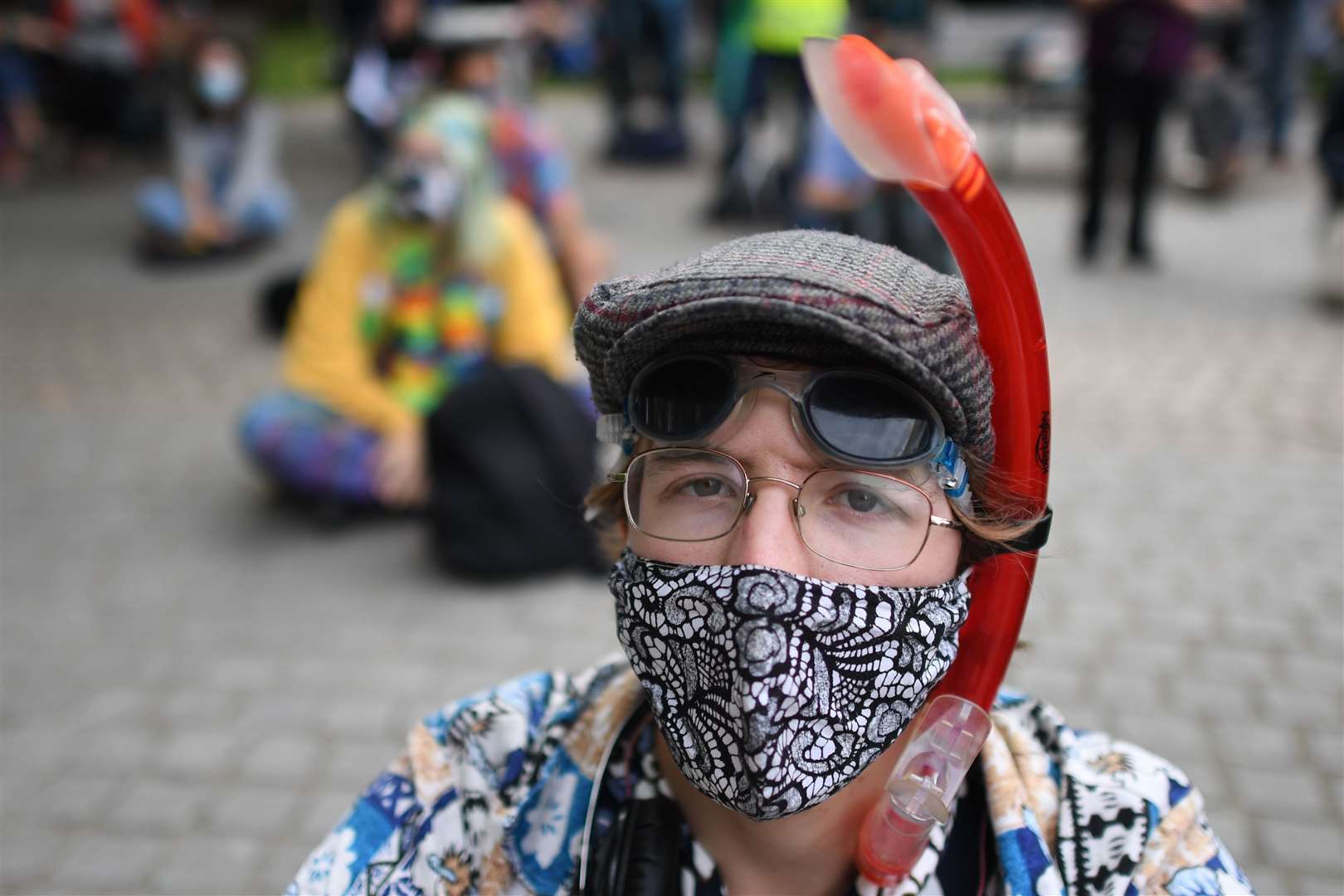 A protester at Gabriel’s Wharf on the South Bank in central London (Stefan Rousseau/PA)