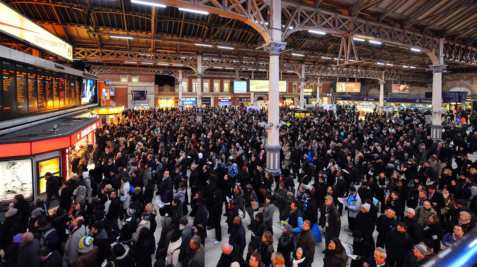 Passengers at Victoria Station in London before the pandemic hit numbers using trains (PA)