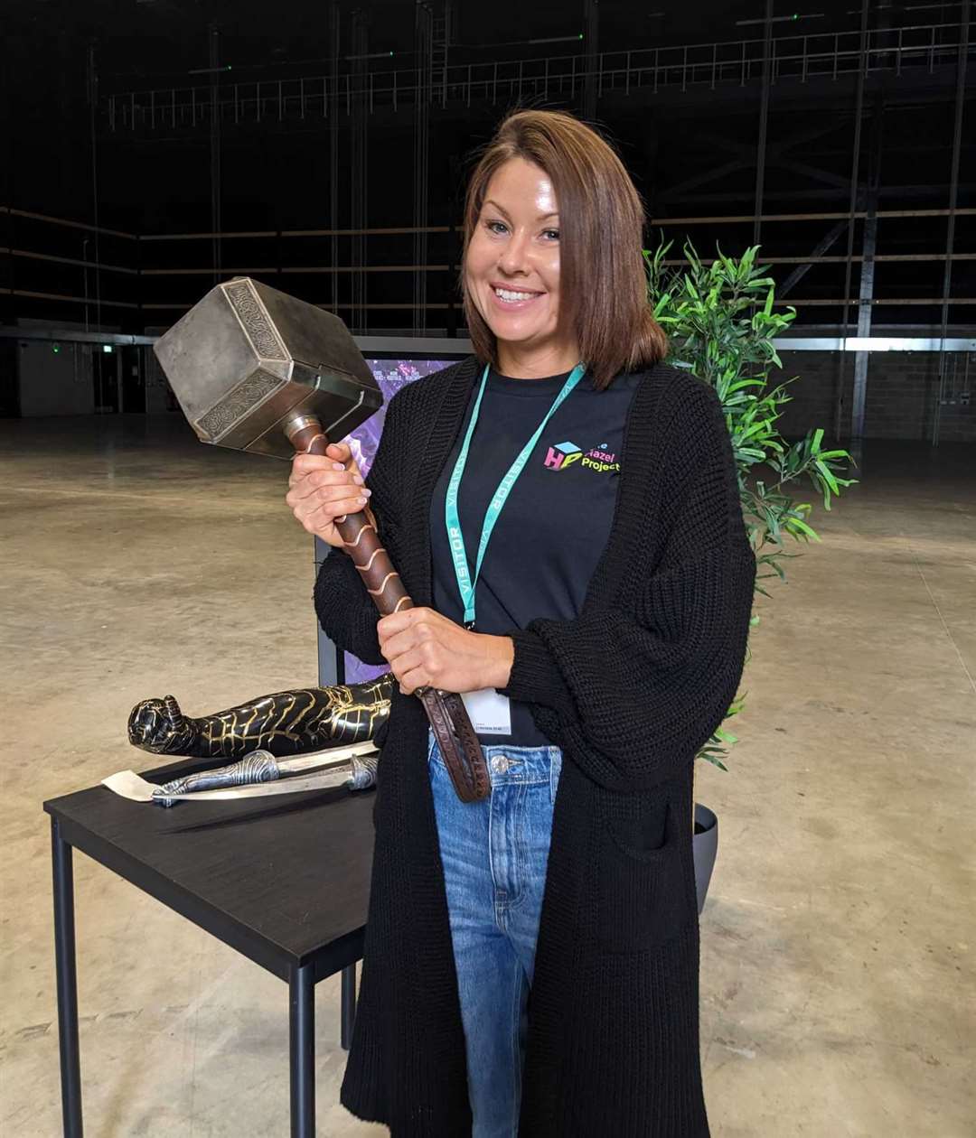 Hazel Project foster parent Donna was able to hold the hammer from the Thor movie. Picture: Hazel Project