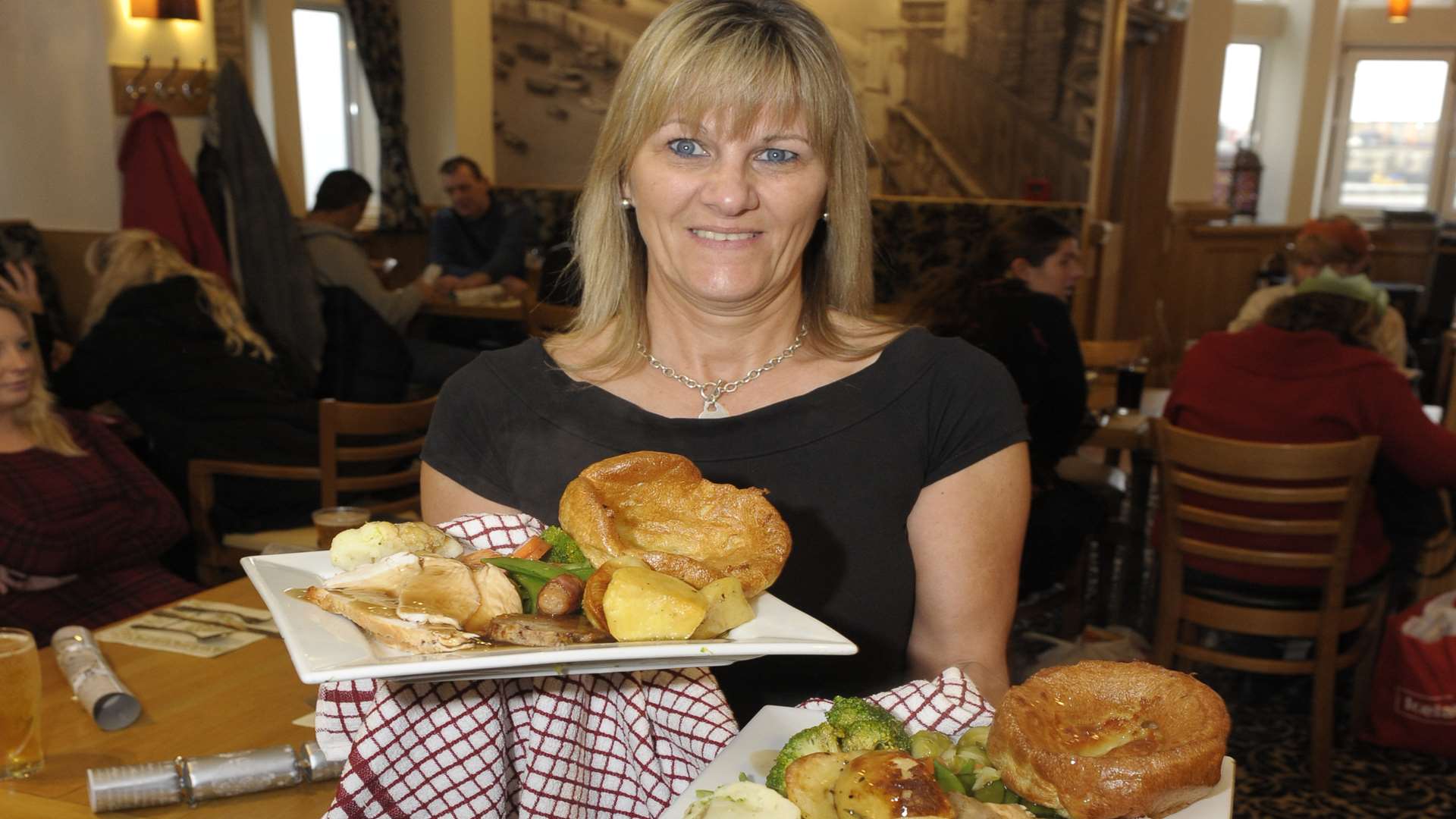 Sharon Summers serving free Christmas meals to people at The Hoy in Margate