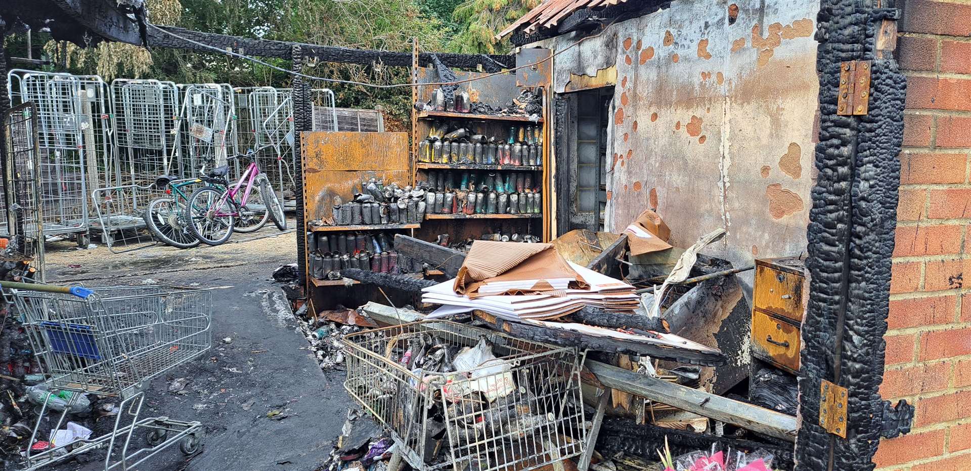 The damaged outbuilding following the fire at Best One in Barming