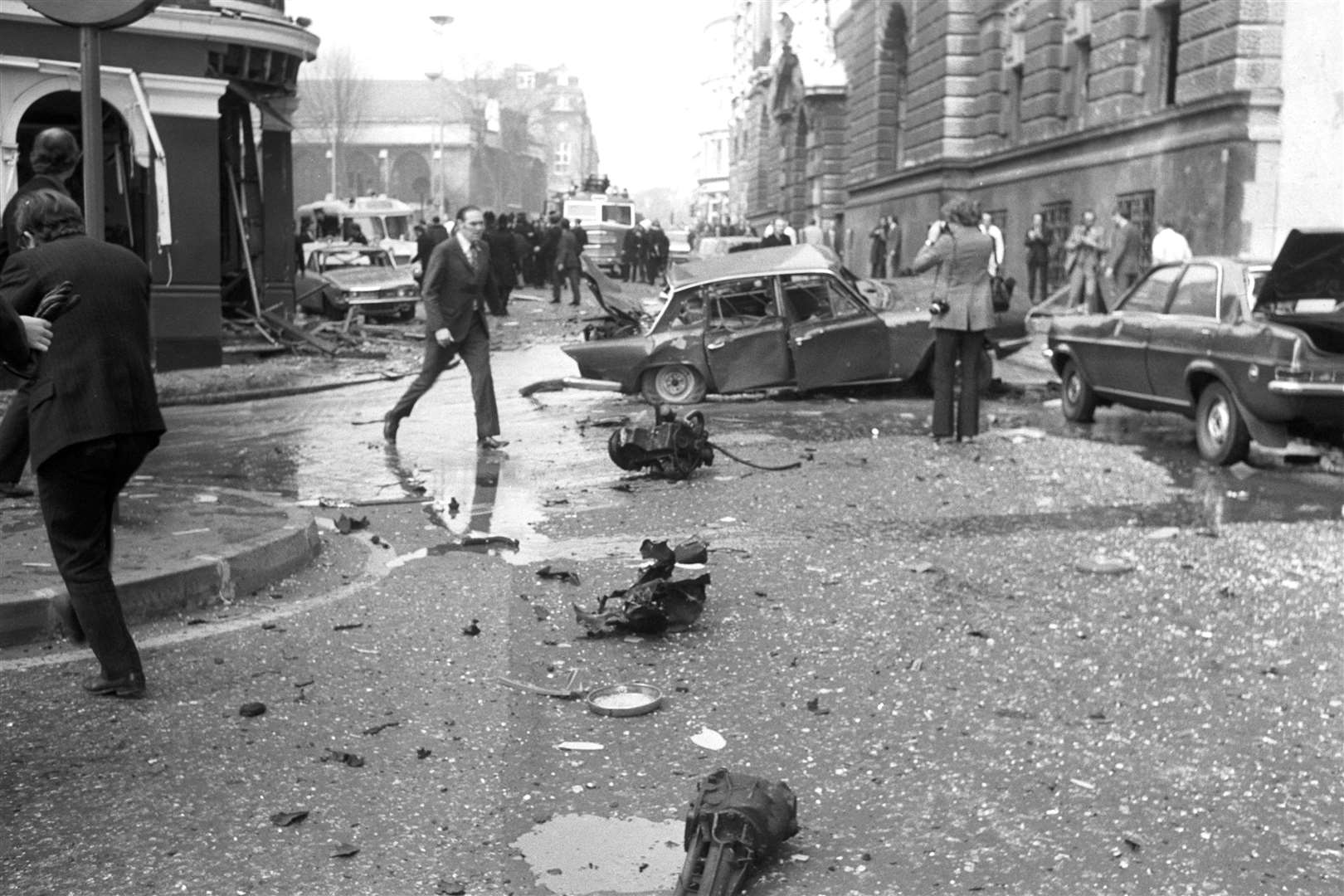 Wrecked cars and debris at the scene after the Old Bailey bomb explosion in London (PA)