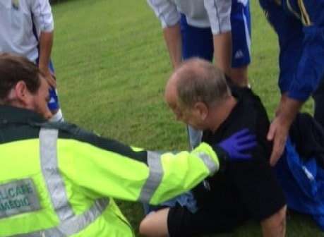 Referee Mick Brookes shortly after being punched