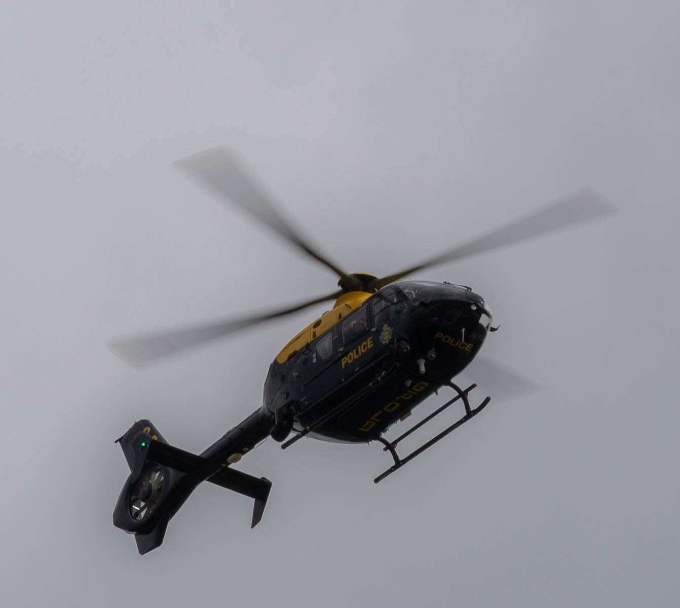 The police helicopter above Maidstone yesterday. Picture: Steve Akehurst
