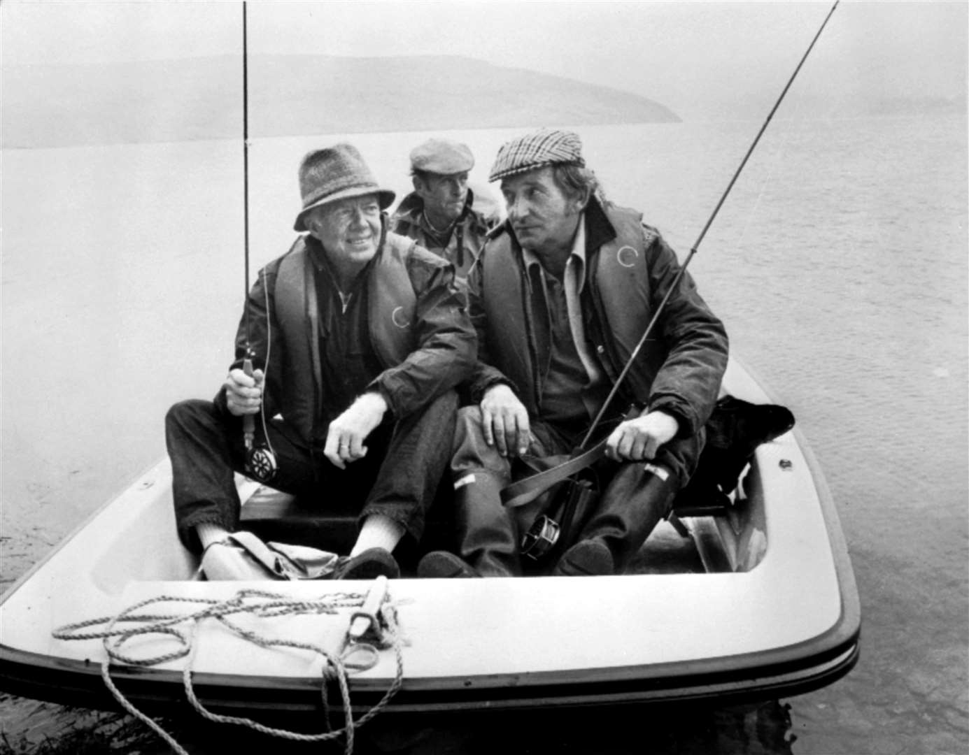 Jimmy Carter trout fishing with Western Mail fishing expert Moc Morgan on Clywedog Reservoir, near Llanidloes, in Wales (Western Mail Cardiff/PA)