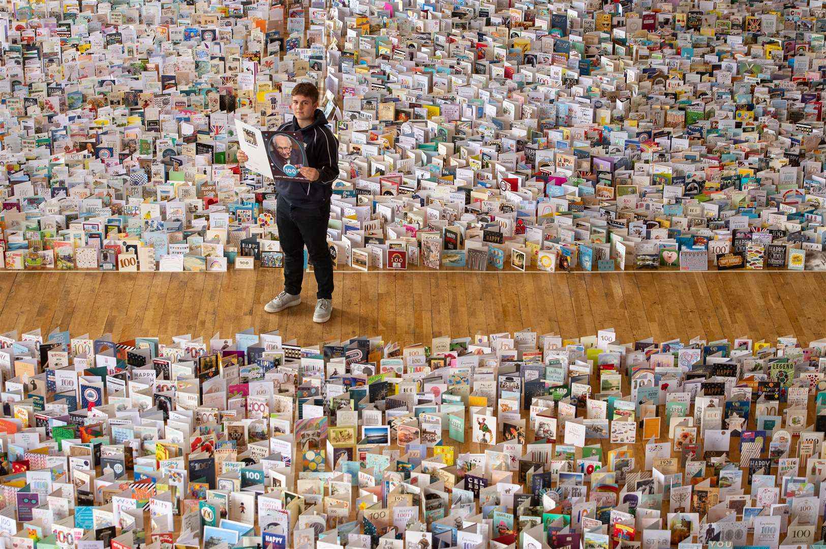 Captain Sir Tom Moore’s grandson Benjie, in the Great Hall of Bedford School where over 140,000 birthday cards were being sorted. (Joe Giddens/ PA)