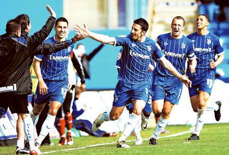 Chris Whelpdale celebrates his first goal of the game