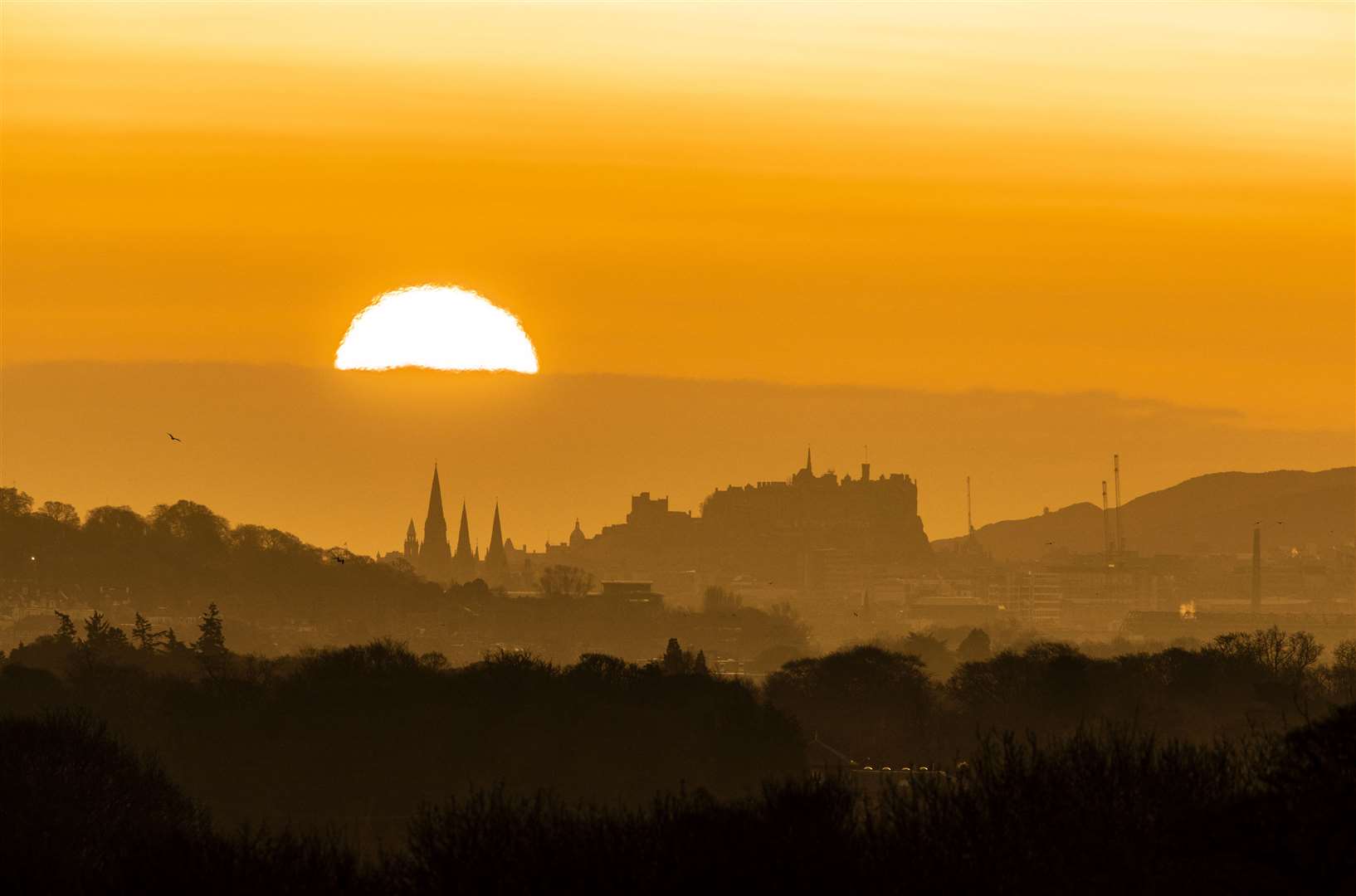 Edinburgh Castle at dawn on Easter Sunday (Jane Barlow/PA)