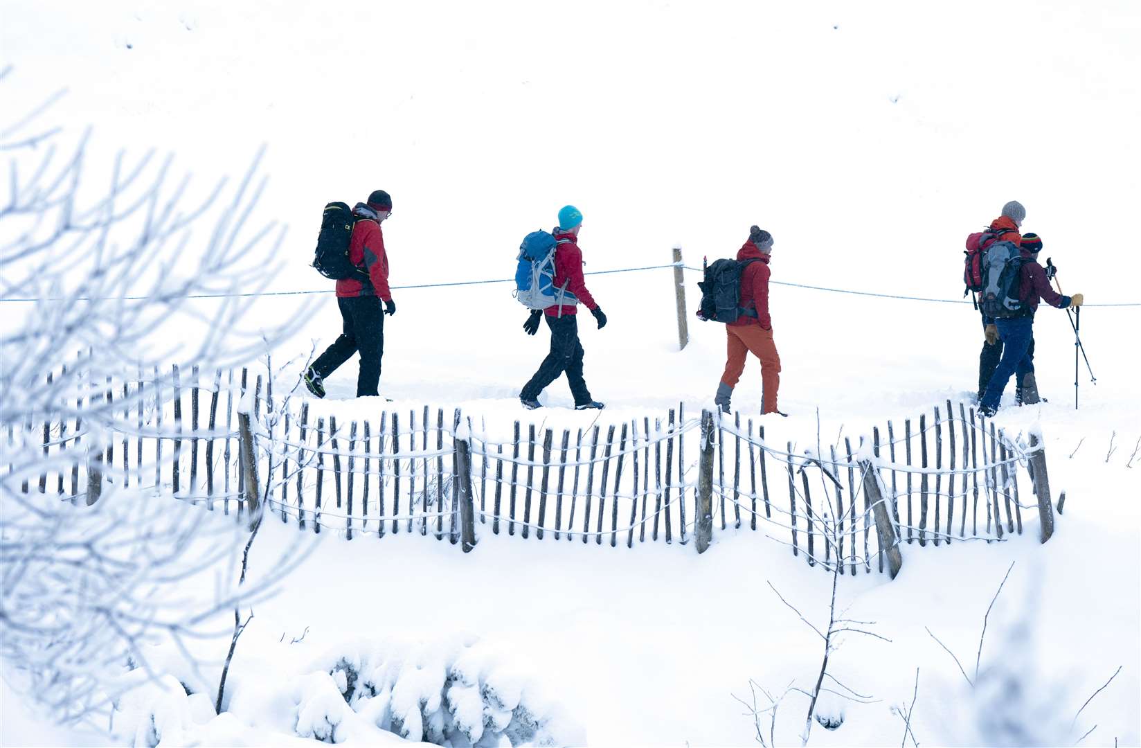 Walkers in snowy conditions in the Cairngorms National Park near Aviemore as Scotland braces for further snowfall (Jane Barlow/PA)