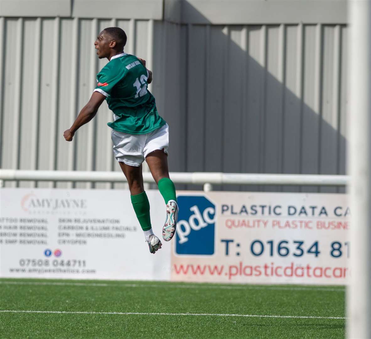 Lanre Azeez jumps for joy after putting Ashford 3-0 up. Picture: Ian Scammell