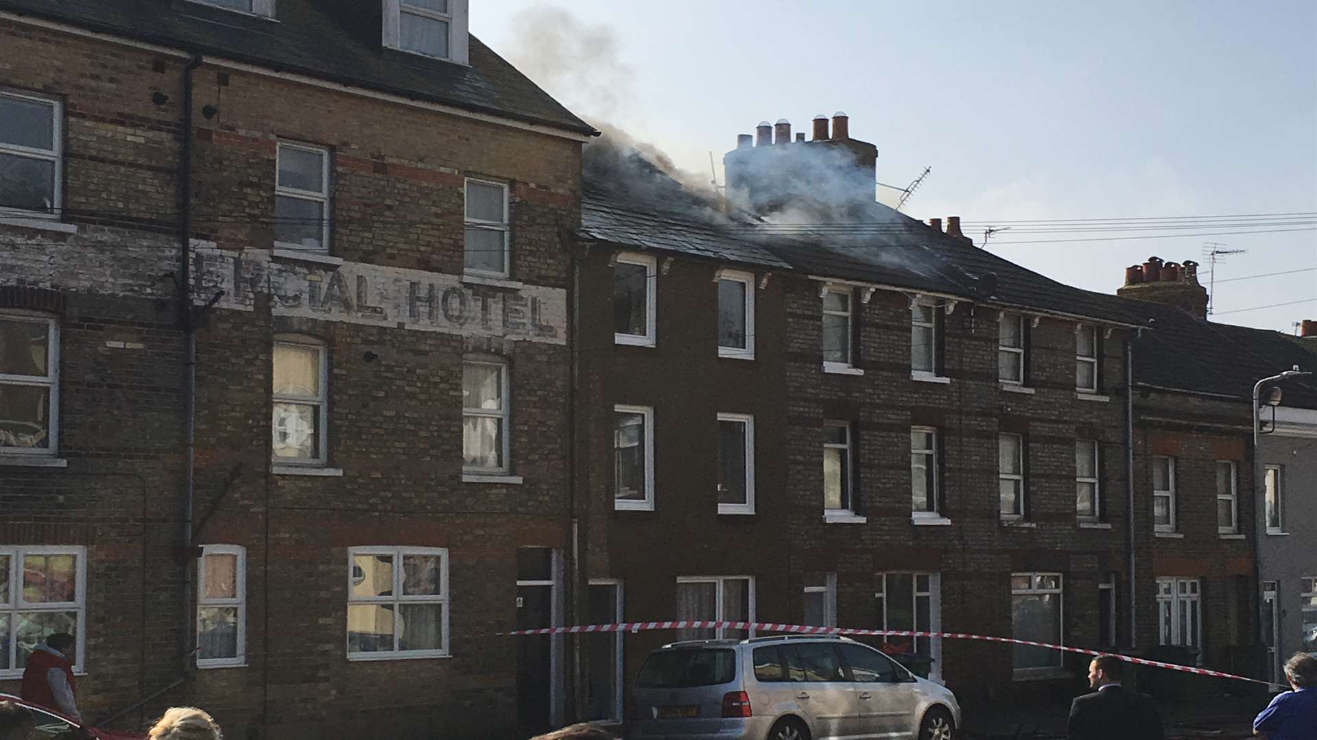 The fire is in the roof space and appears to have spread into the next house. Picture: Beccy Pollard