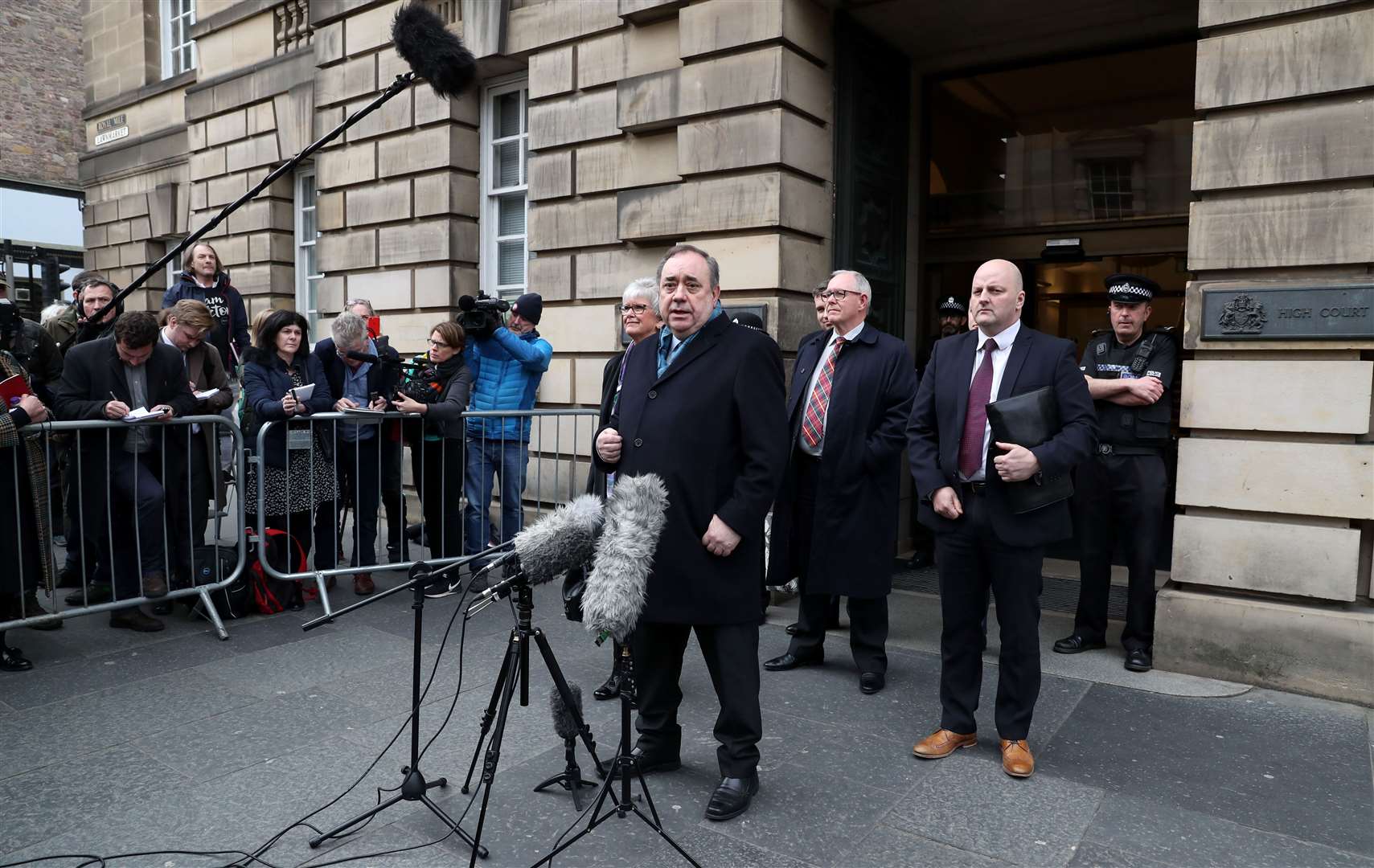 Alex Salmond speaks outside the High Court in Edinburgh after he was cleared of 13 charges last March (Andrew Milligan/PA)