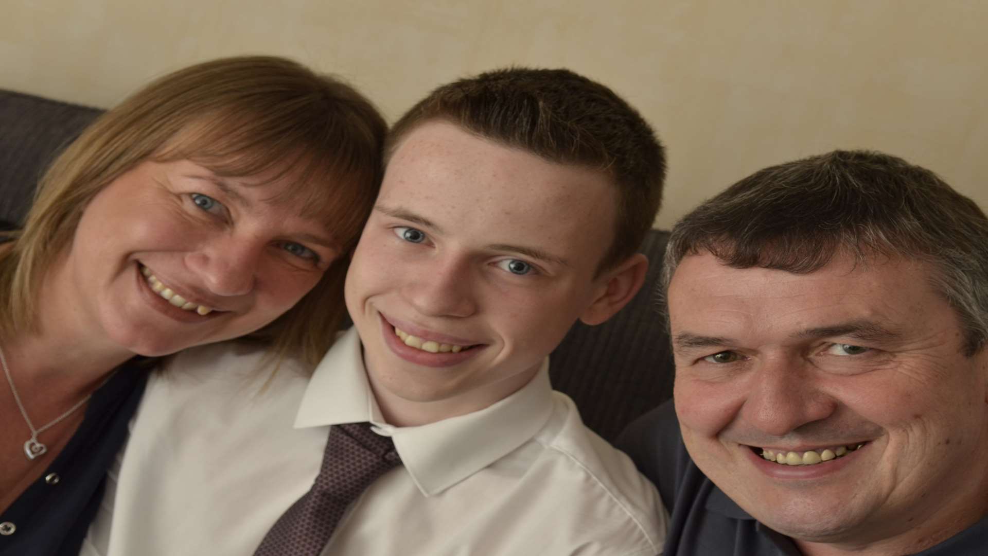 Liam Bennett with parents, Sue and Simon