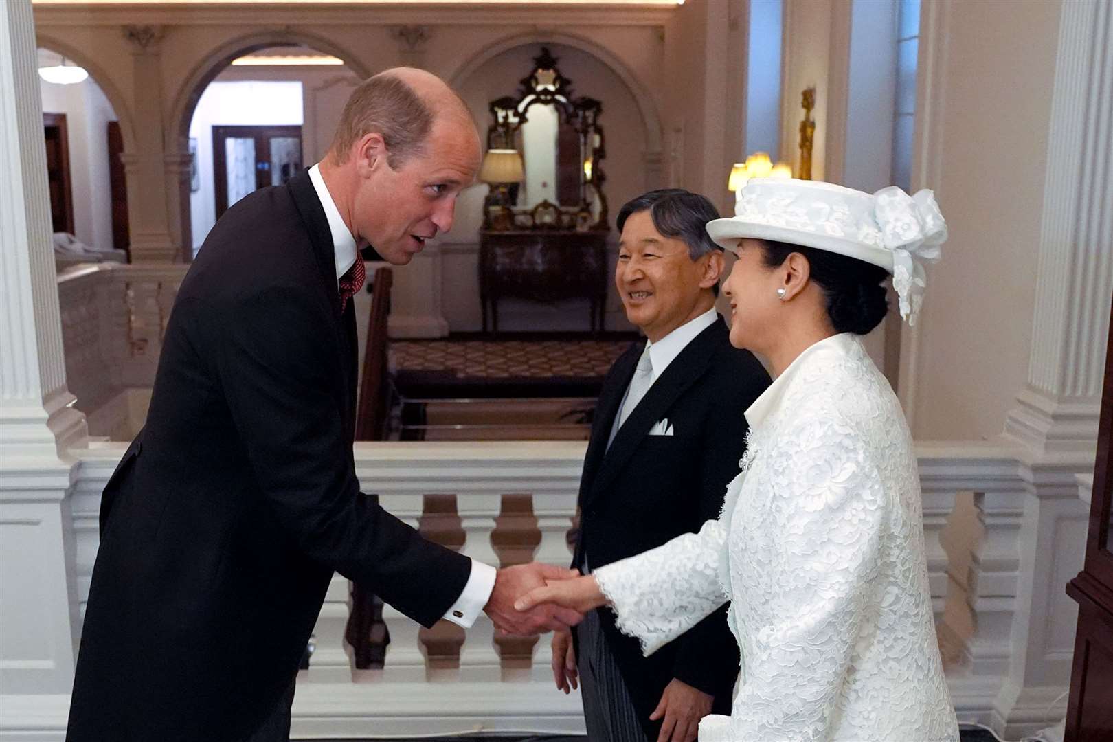 The Prince of Wales greets Emperor Naruhito and his wife Empress Masako of Japan (Jordan Pettitt/PA)