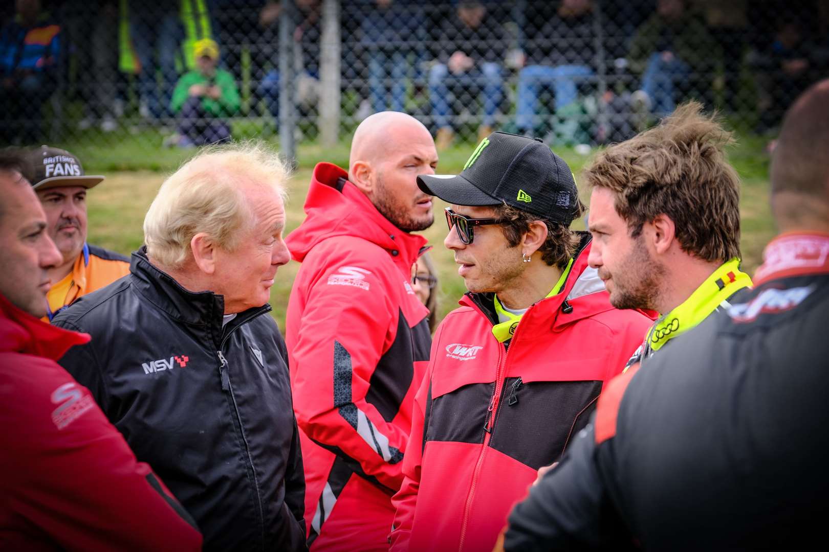 Brands Hatch owner Jonathan Palmer chats to Rossi before race two