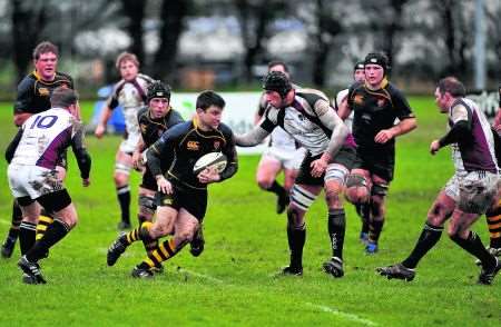 Canterbury run the ball against Taunton