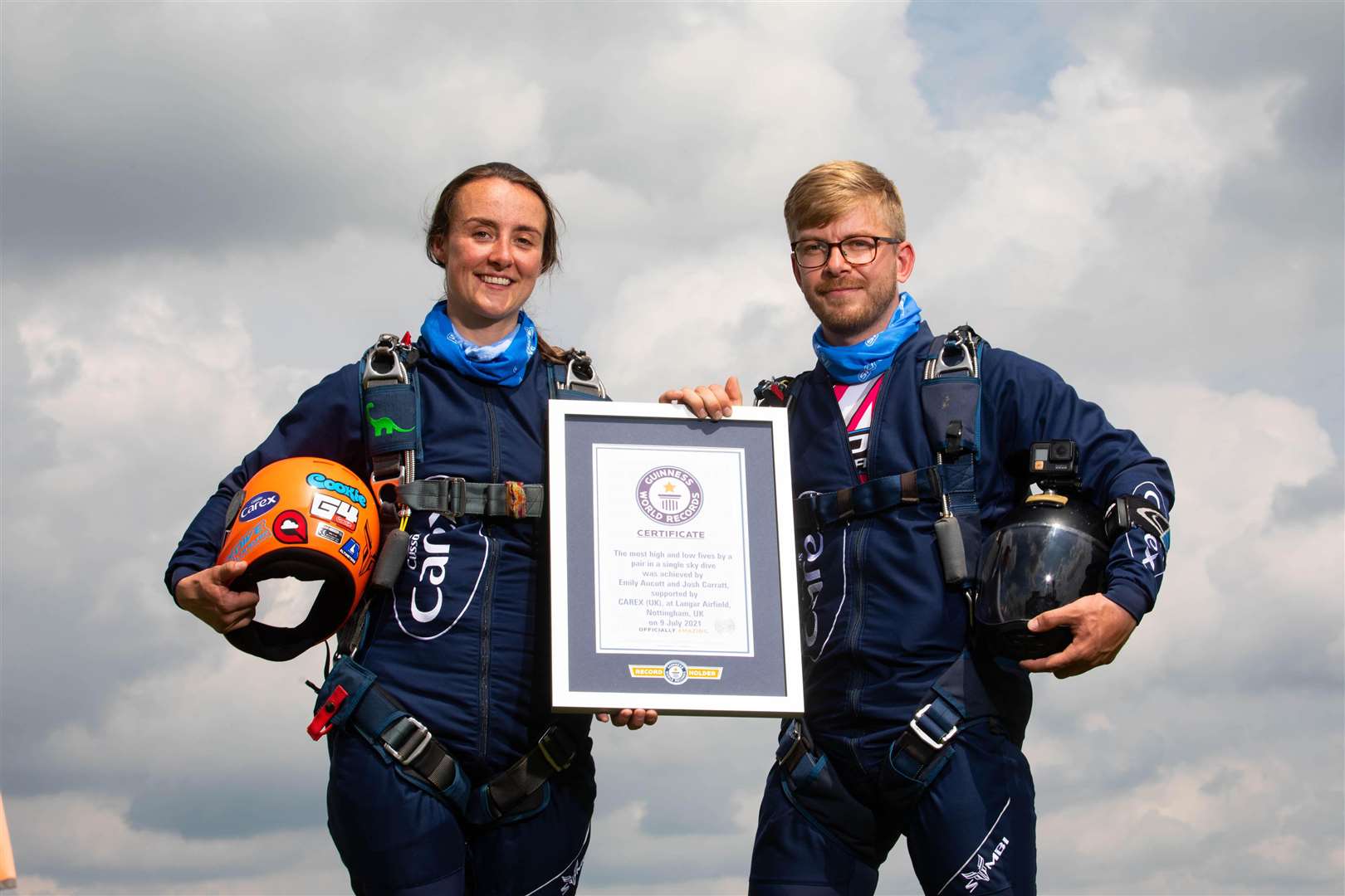 Emily Aucutt and Josh Carratt managed 32 high or low fives during their skydive (David Parry/PA)