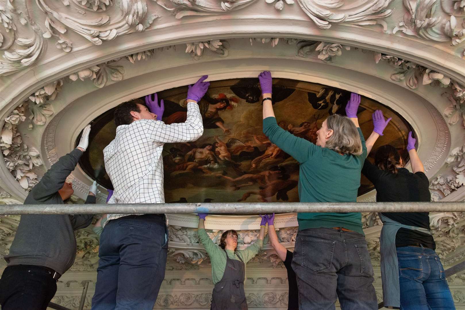 Conservation staff with the ceiling art (Royal Collection Trust/Her Majesty Queen Elizabeth II 2020/PA)