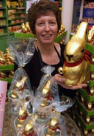 Linda Jakeman of Whittard of Chelsea with some of the Lindt chocolate bunnies the store is donating to support the Walking Bus Project's Easter Egg hunt.
