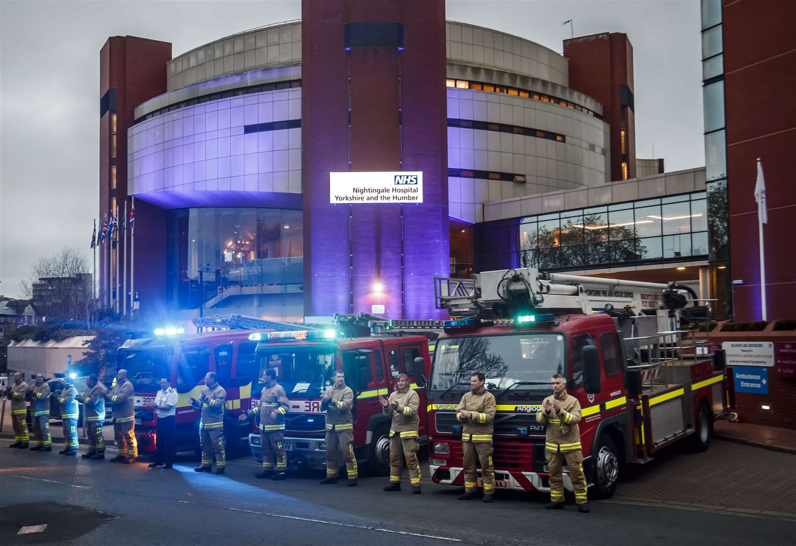 Firefighters clapped outside the new Nightingale Hospital at the Harrogate Convention Centre (Danny Lawson/PA)