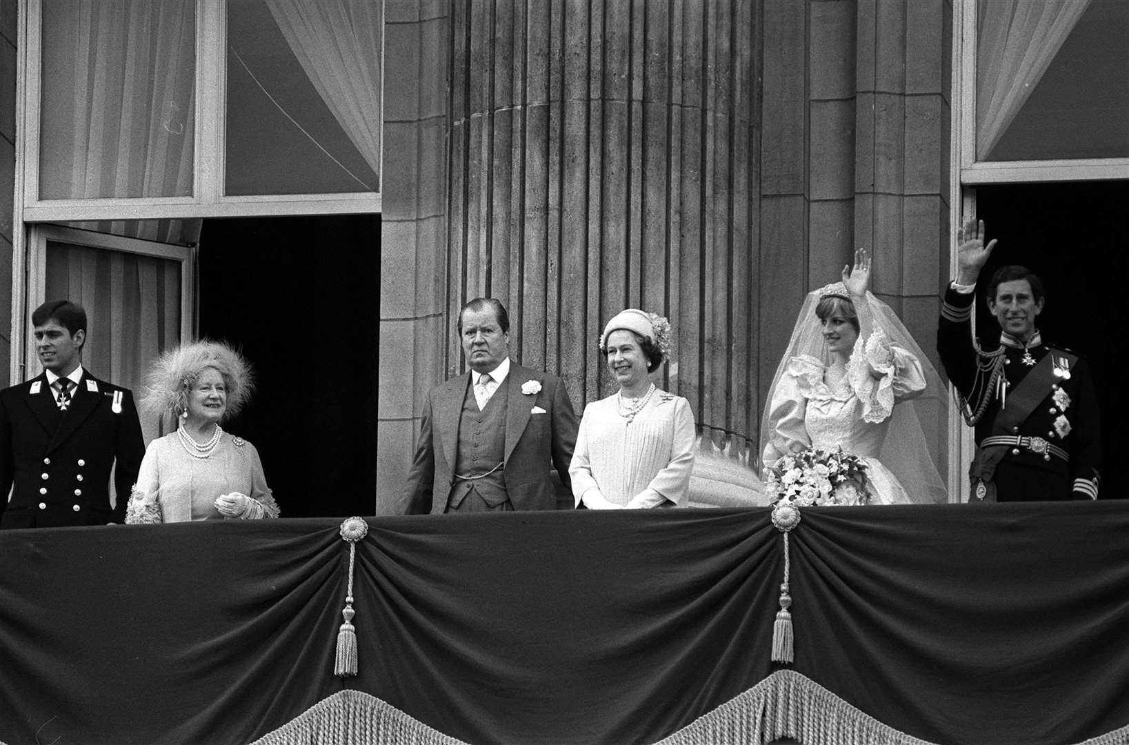 Prince Andrew, the Queen Mother, Earl Spencer and the Queen with the newlywed Prince and Princess of Wales (PA)