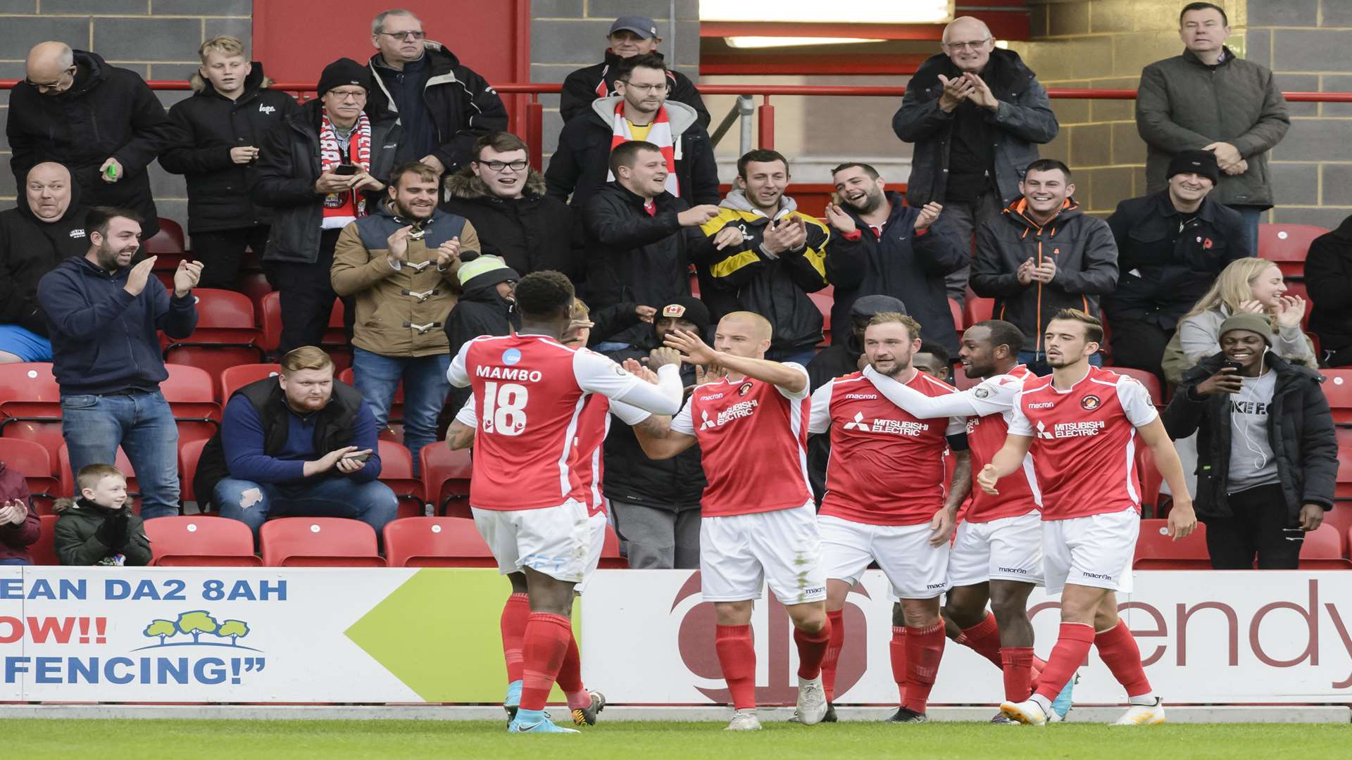Ebbsfleet celebrate a goal in front of the new main stand Picture: Andy Payton
