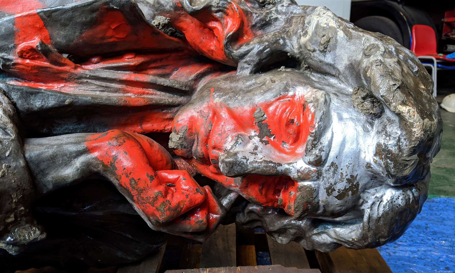 Paint was sprayed over the statue after it was toppled (Bristol City Council/PA)