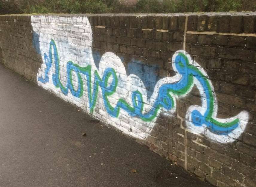 Graffiti on the railway bridge at the top of Telegraph Road