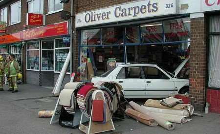 The car minutes after it ploughed into the store. Picture: NICK EVANS