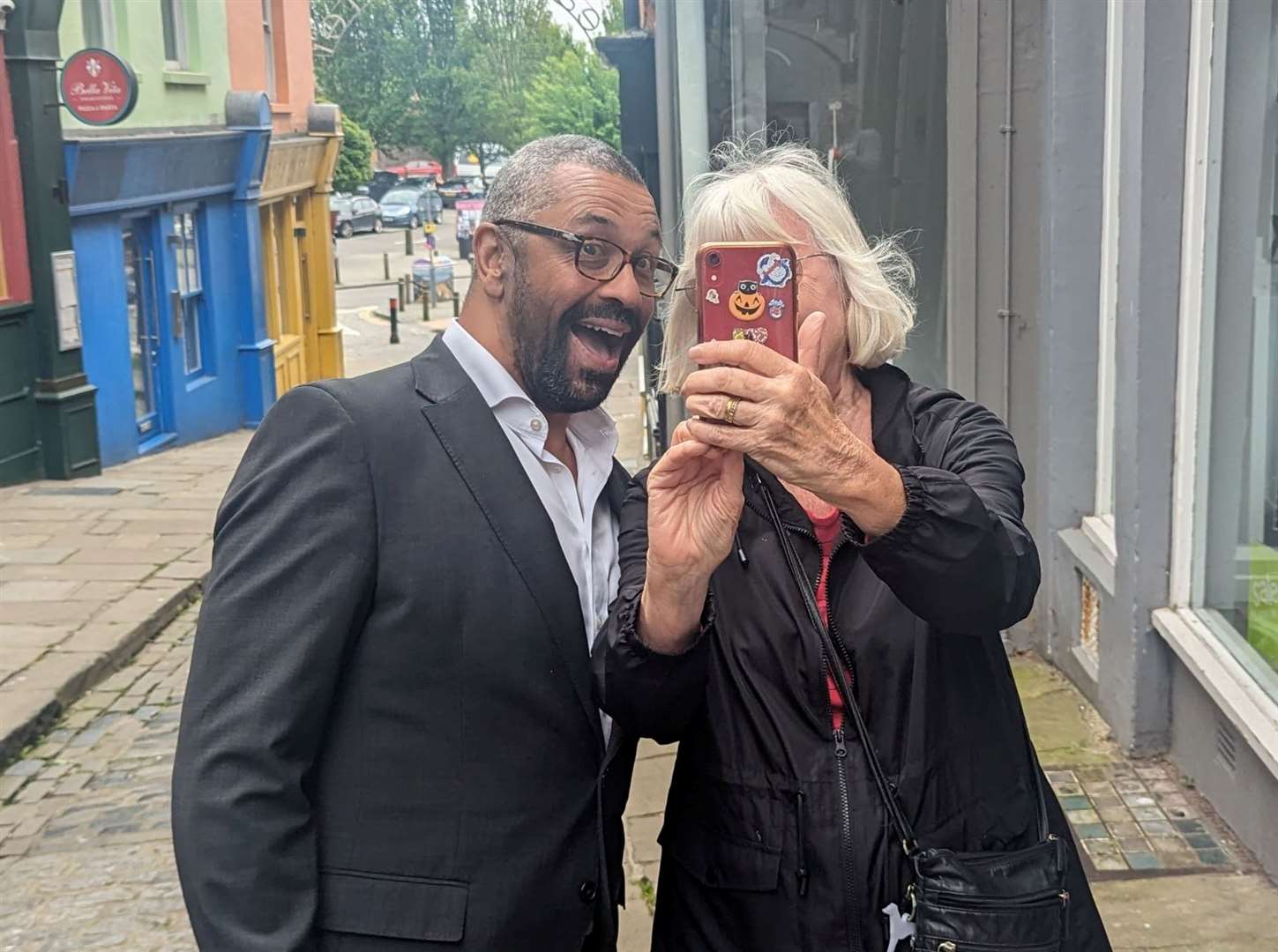 James Cleverly posing for a selfie in the Old High Street while campaigning in Folkestone