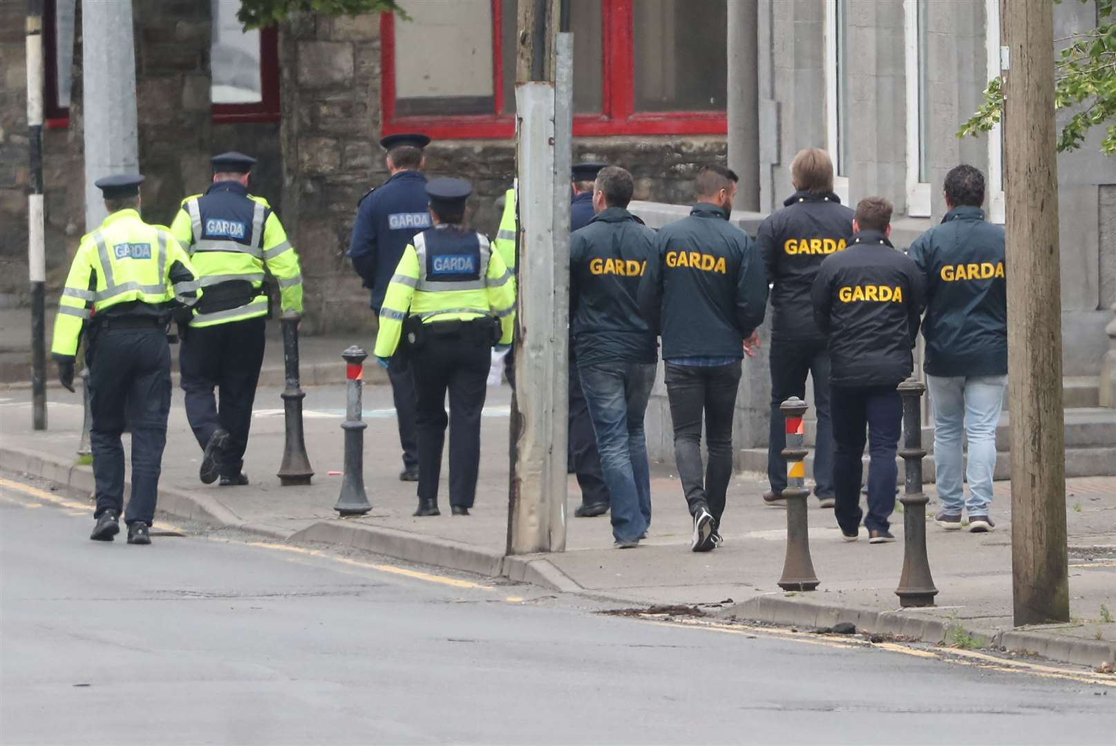 Garda at the scene in Castlerea, Co Roscommon (Niall Carson/PA)