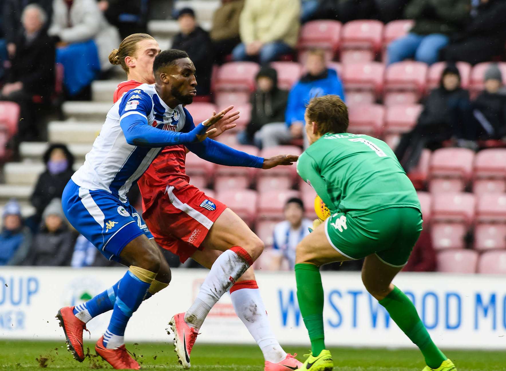 Tom Eaves is crowded out in the Wigan box Picture: Andy Payton