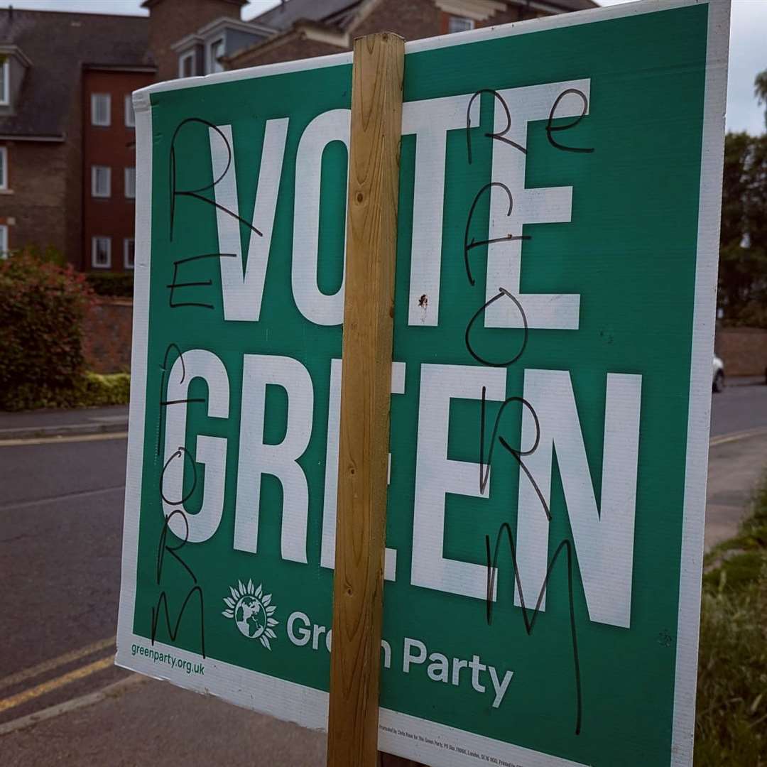 A Green Party poster with "Reform" scribbled on it