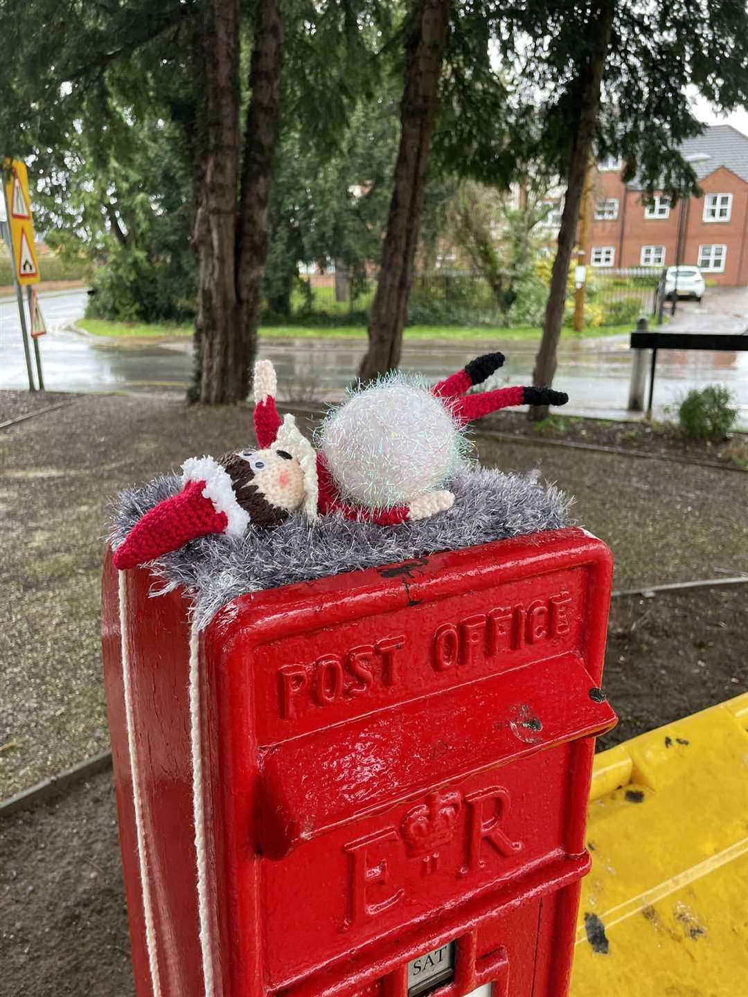 Pat the topper elf crushed by a snowball (Brough Yarn Bombers/PA)